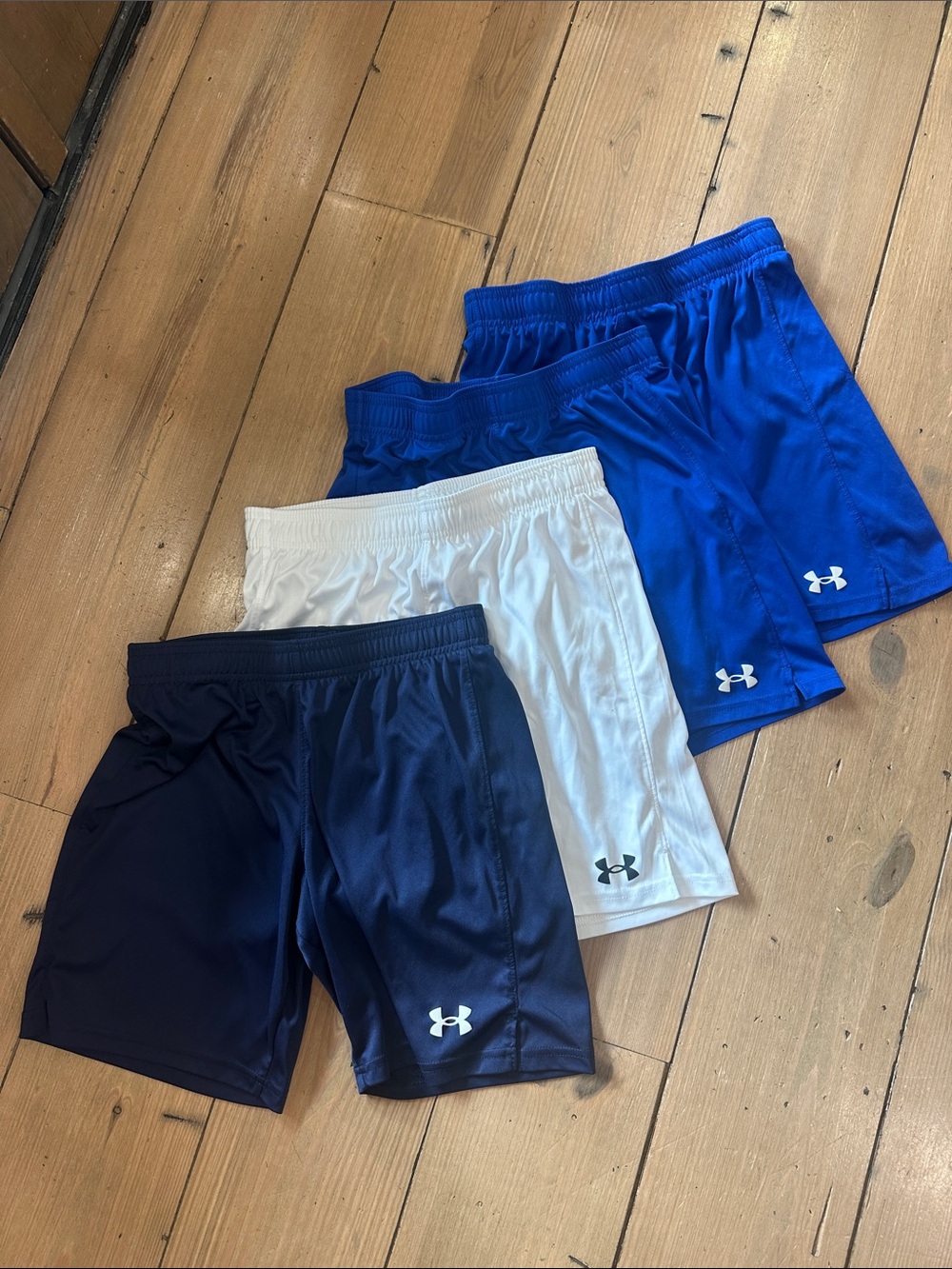 Under Armour Heat Gear Athletic Shorts set of 4 in Blue, White, Navy